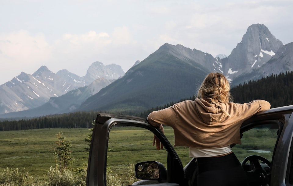 Woman looking at a mountain