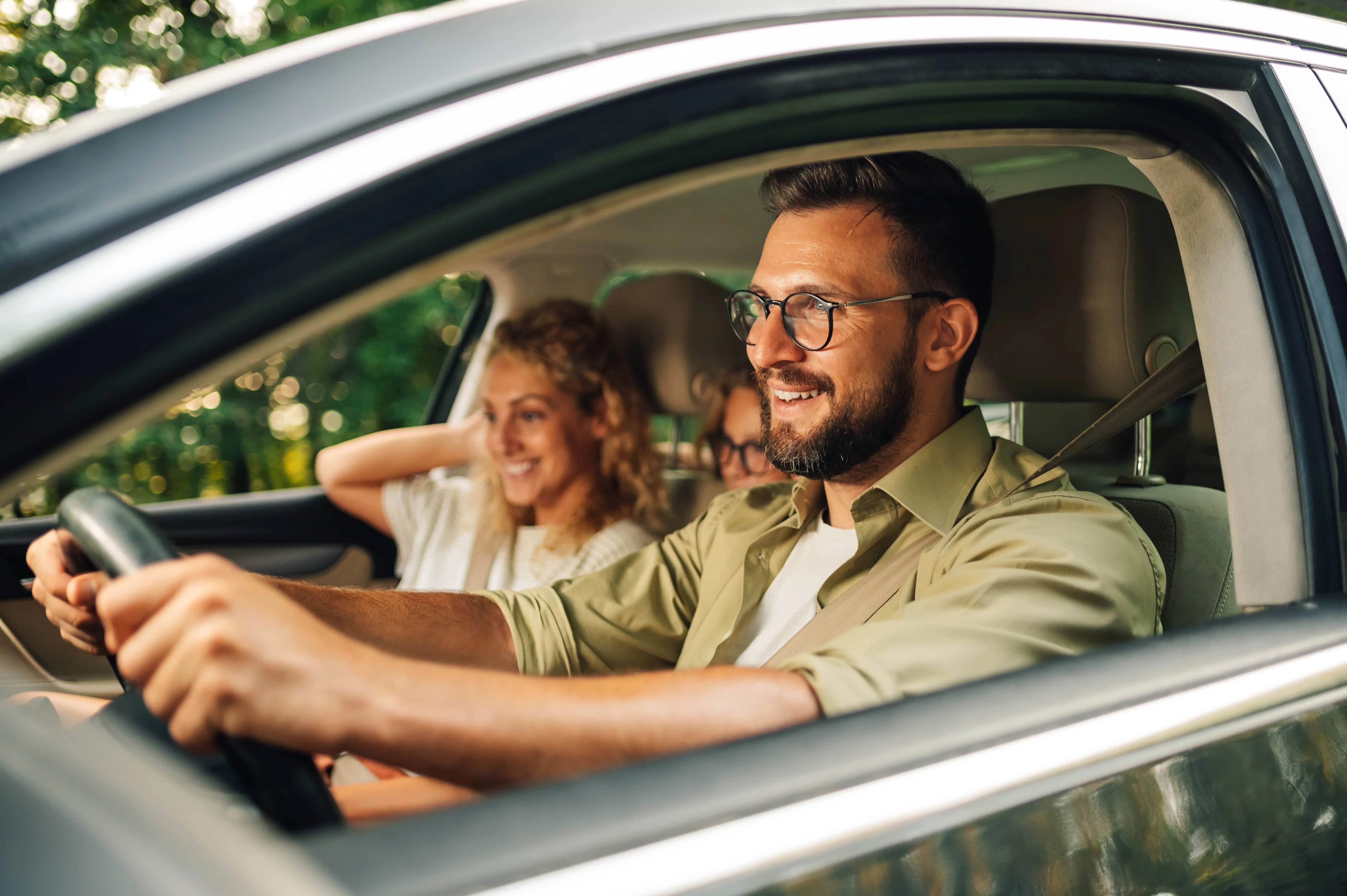 Family in car, dad driving