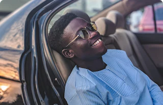 Passenger resting in car